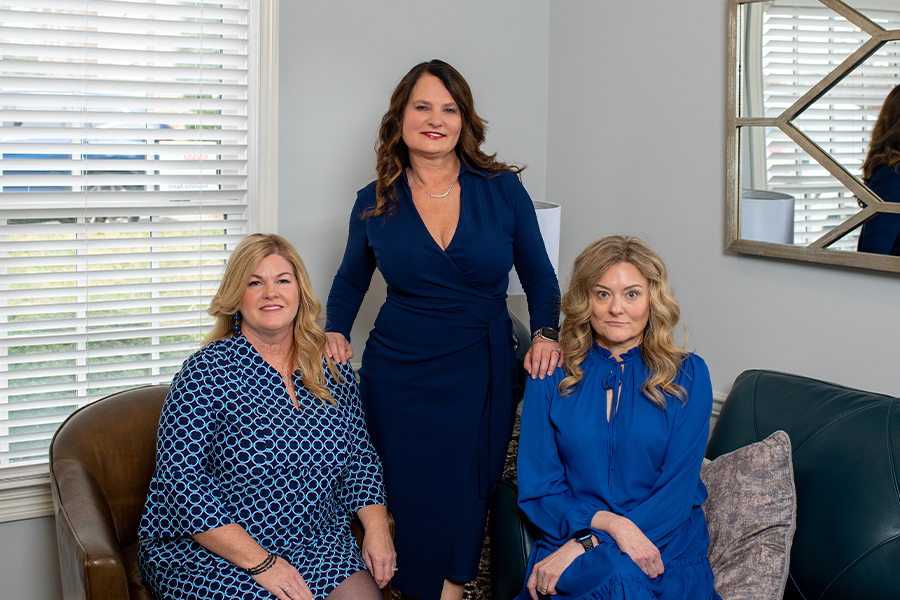 About Us - Portrait of Renee Jackson Insurance Agency Team in the Office Waiting Area